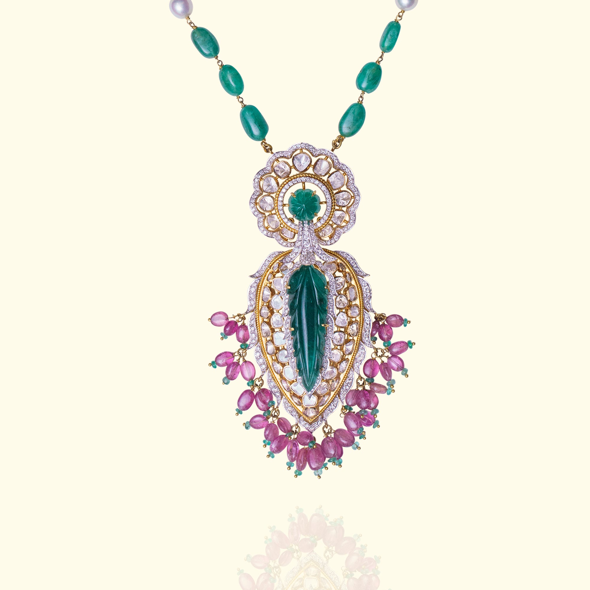 Carved emerald Polki diamond gold drop pendant, luxury handcrafted traditional Indian jewellery, statement pendant