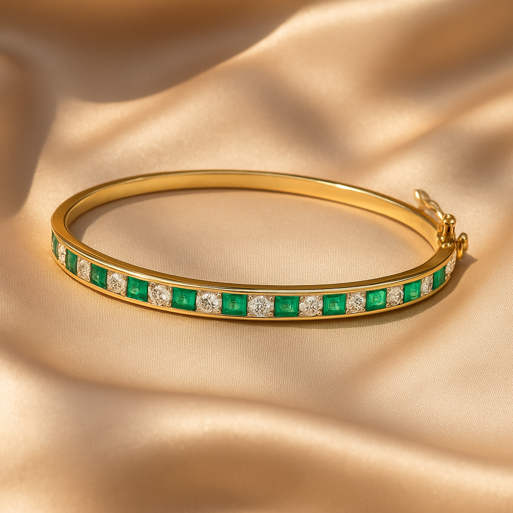 Emerald and diamond gold half bangle, handcrafted fine jewellery, luxury elegant bracelet for women