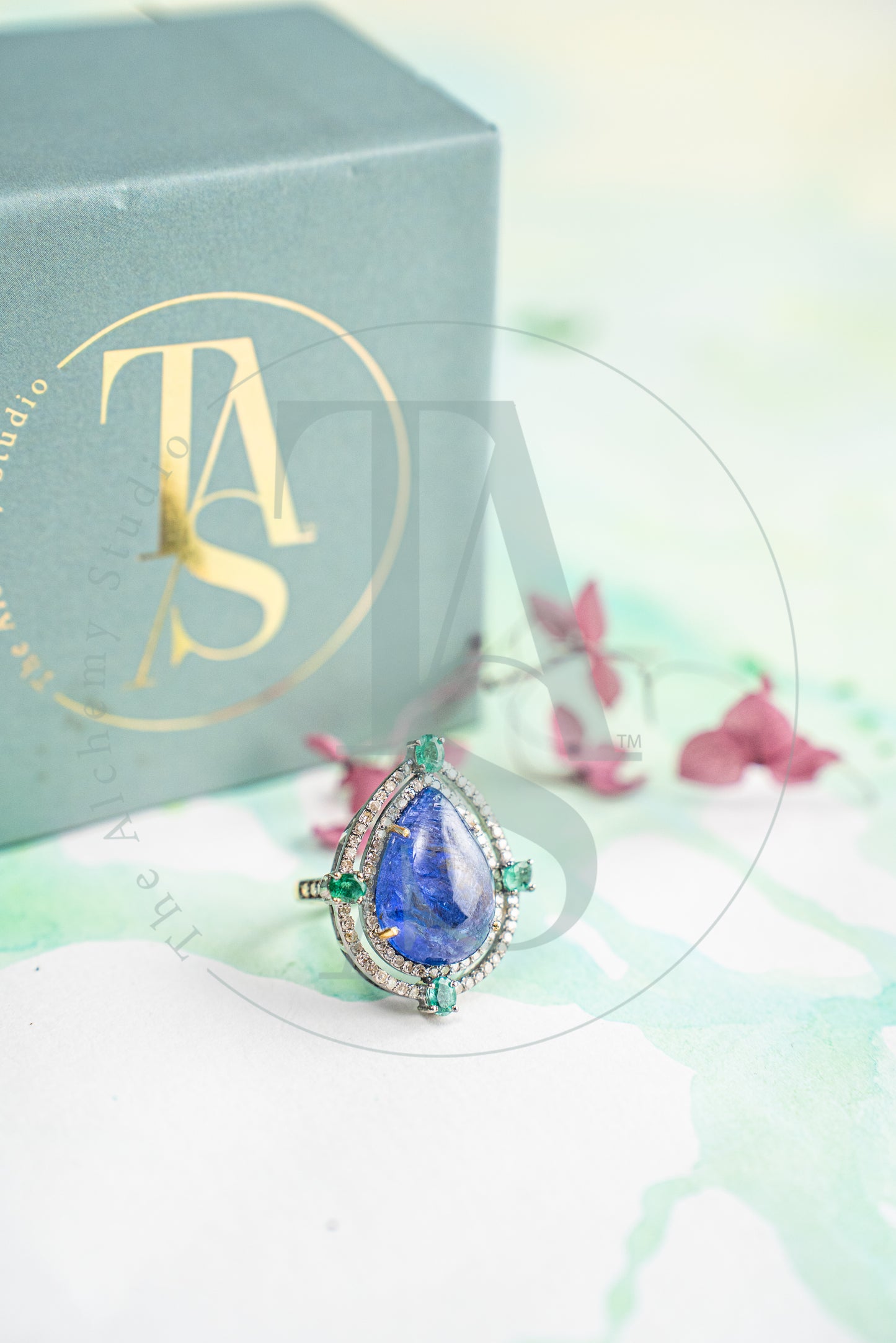 Albinia Tanzanite and Emerald Rings