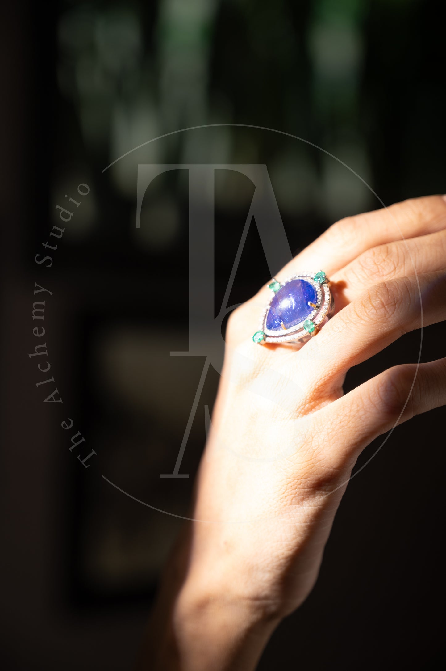 Albinia Tanzanite and Emerald Rings