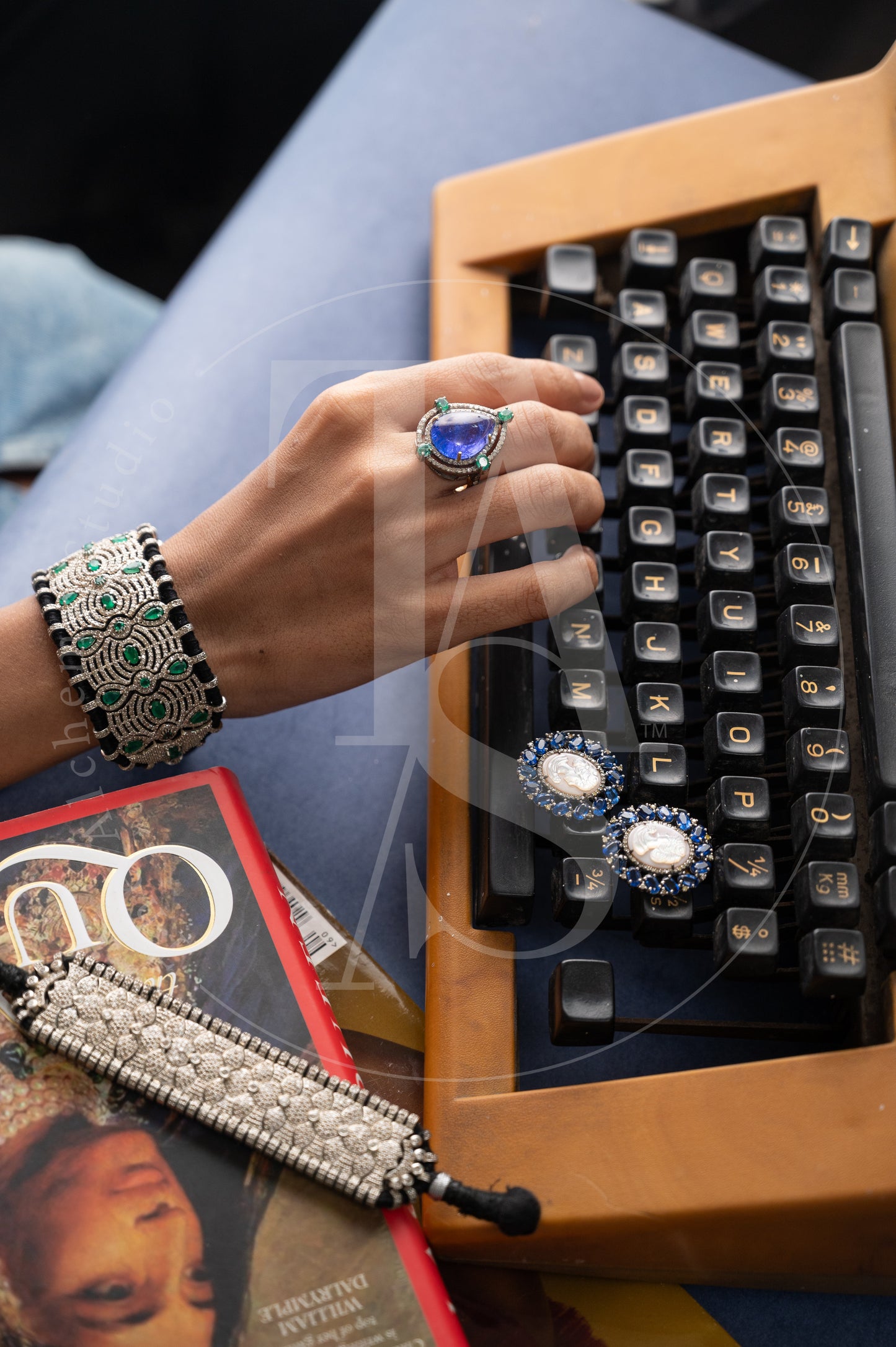 Albinia Tanzanite and Emerald Rings