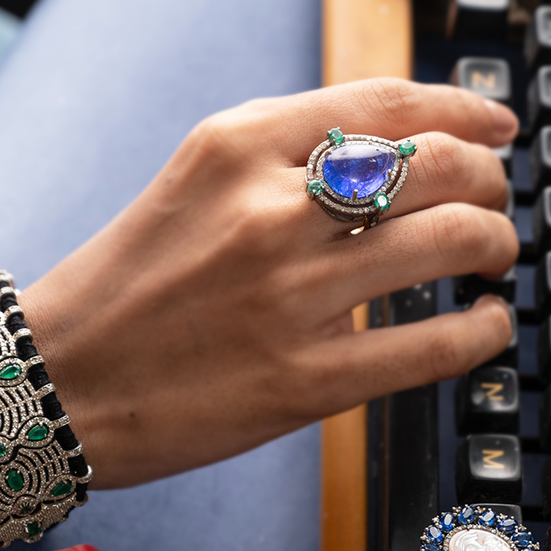 Albinia Tanzanite Emerald Diamond Rings