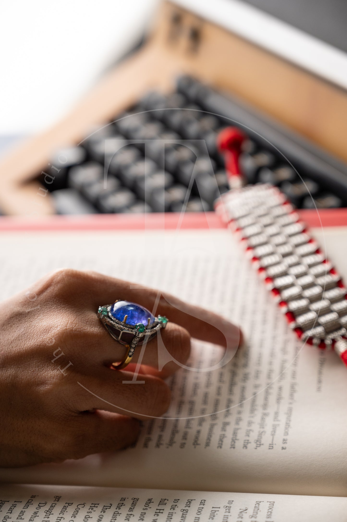 Albinia Tanzanite and Emerald Rings
