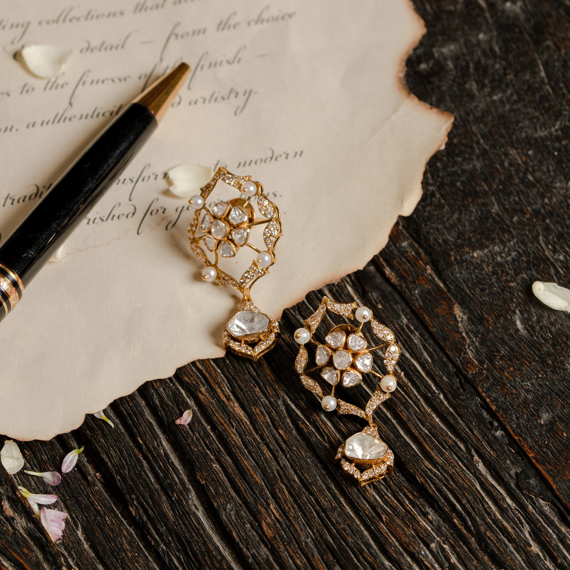 Polki uncut diamond gold drop earrings with intricate jaali design, handcrafted luxury jewellery