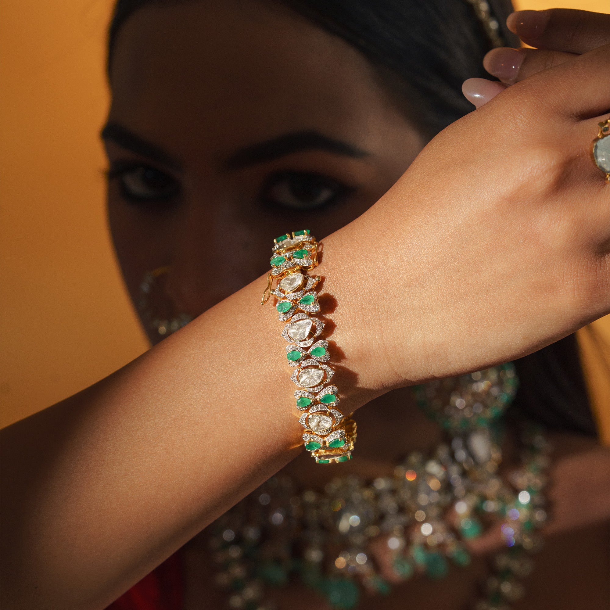 Emerald and Polki diamond gold bracelet, traditional artisanal jewellery India