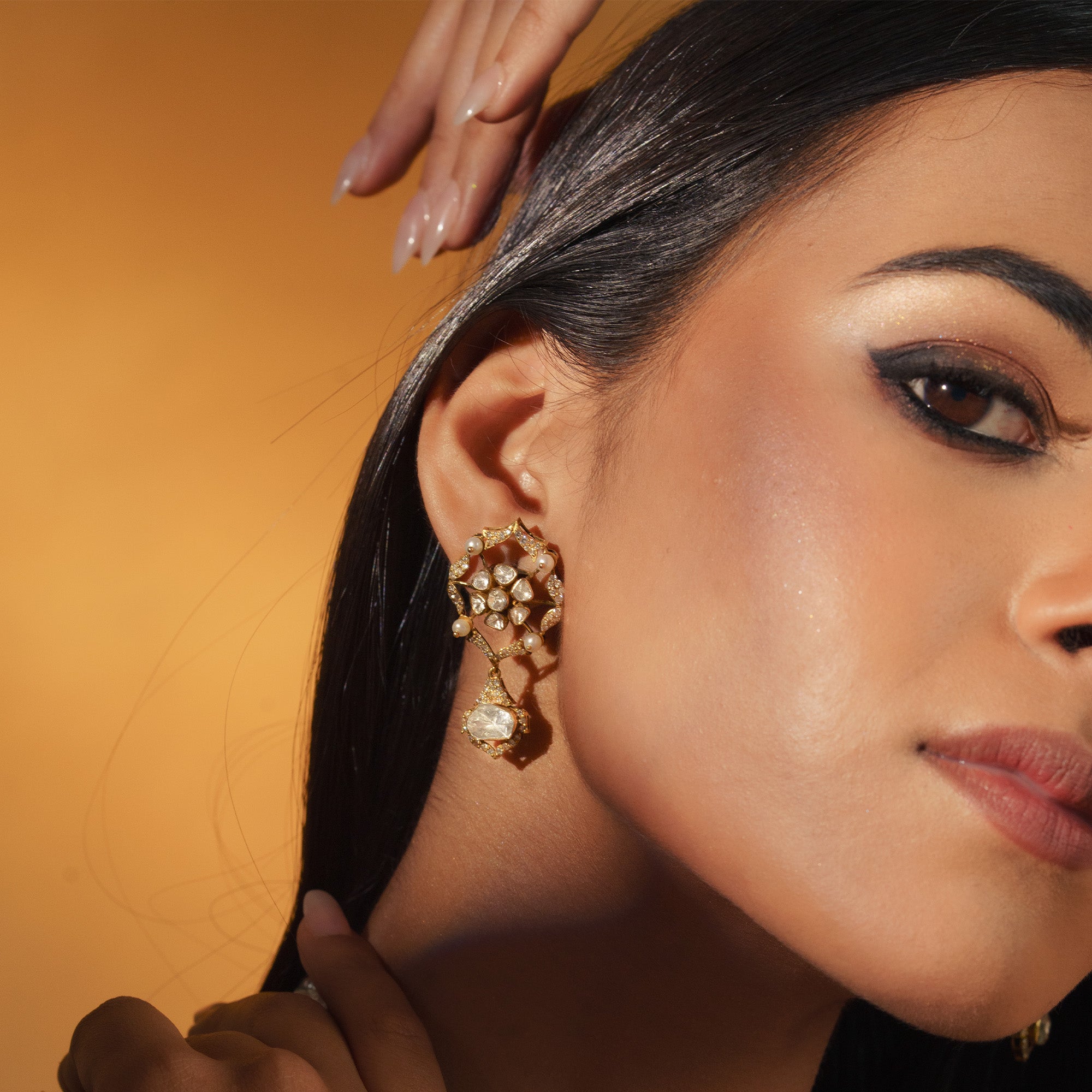 Polki uncut diamond gold drop earrings with intricate jaali design, handcrafted luxury jewellery