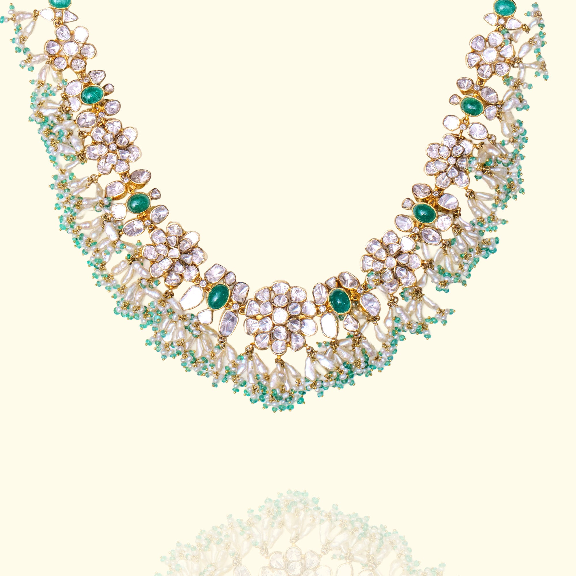 Emerald and Polki diamond gold overlapping necklace, traditional luxury handcrafted jewellery
