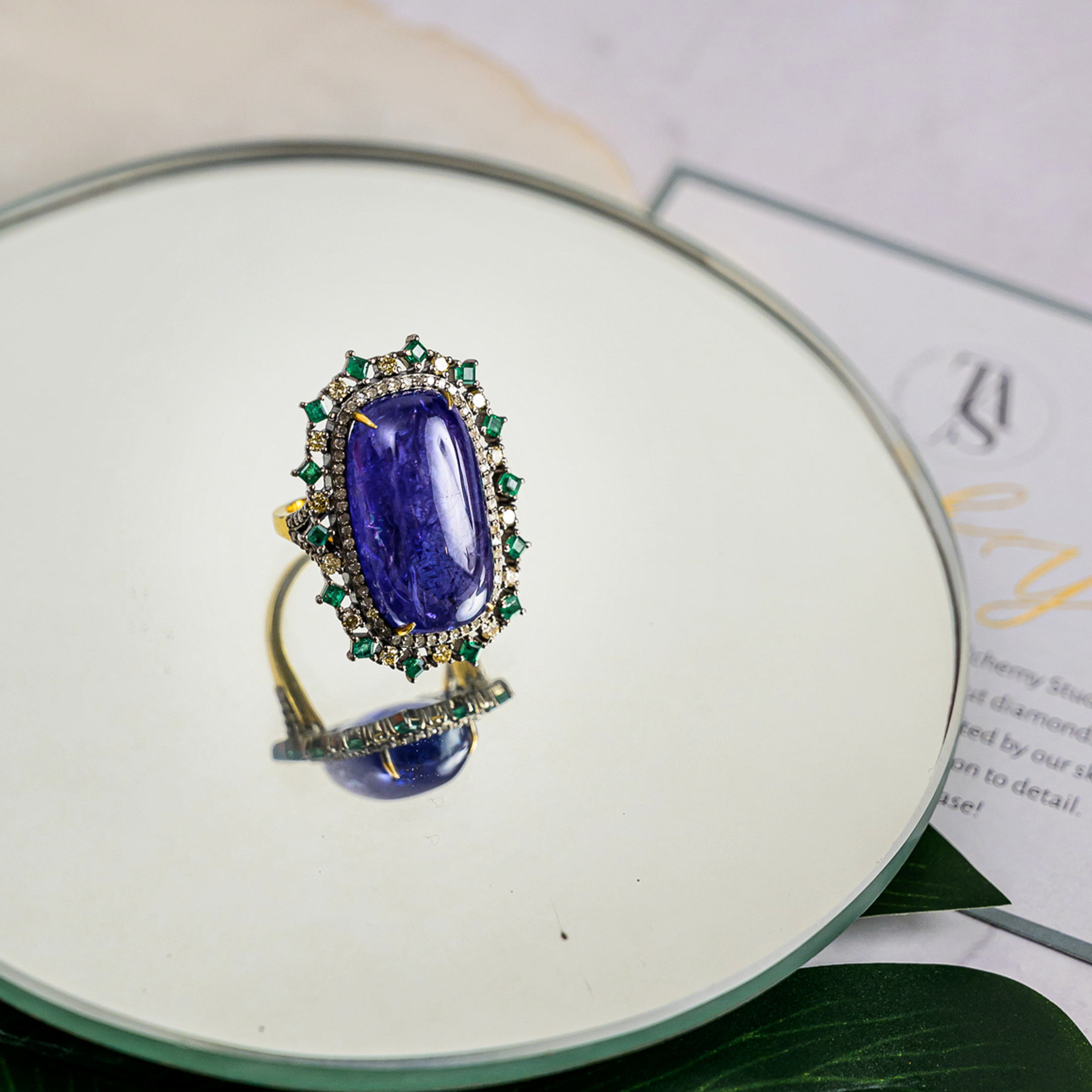 Constella diamond tanzanite emerald Ring