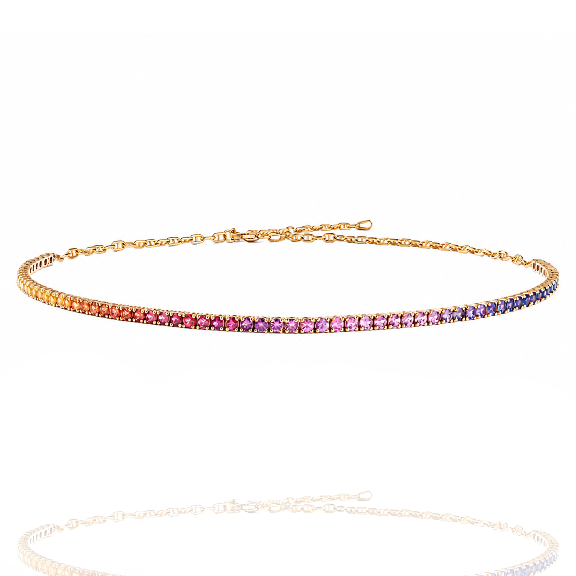 Gold chain necklace with multicolored gemstones on a white background in india