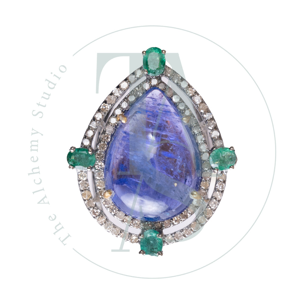 Albinia Tanzanite and Emerald Rings
