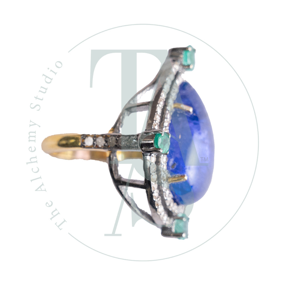 Albinia Tanzanite and Emerald Rings
