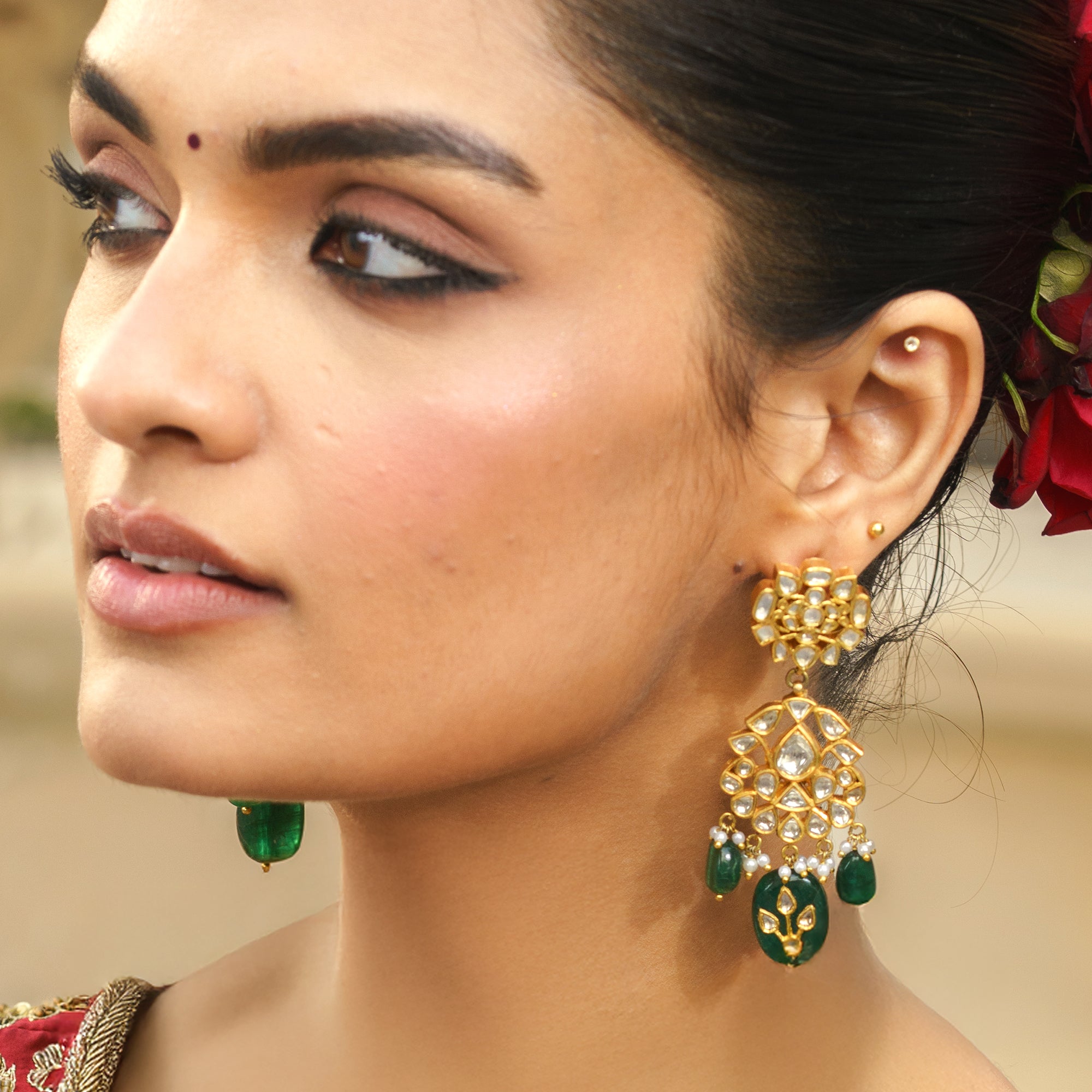 Emerald and Polki diamond gold earrings, luxury handcrafted traditional fine jewellery