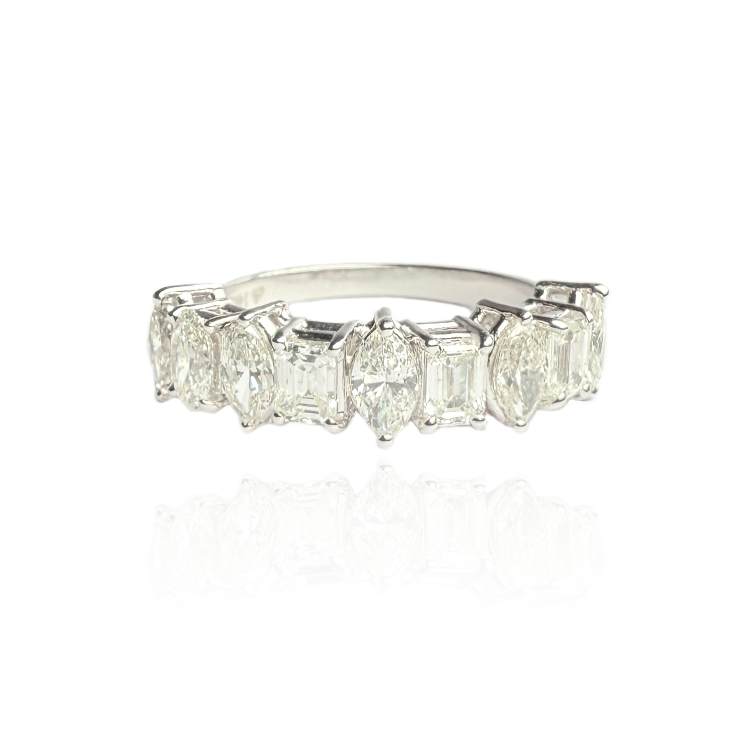 Drop and Emerald Cut Diamond Ring